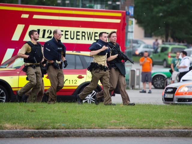 Policemen arrive at a shopping centre in which a shooting was reported, in Munich. (AP Photo) Policemen arrive at a shopping centre in which a shooting was reported, in Munich. (AP Photo)