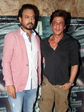 Irrfan Khan and Shah Rukh Khan at a special screening of Madaari in Mumbai. (AFP)