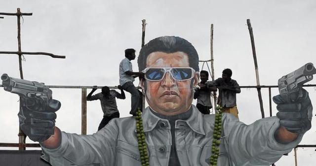 Fans of Rajinikanth pour milk as an offering over his cut-out on the release date of his new movie "Endhiran" (Robot) in Chennai in October, 2010. (Reuters) Fans of Rajinikanth pour milk as an offering over his cut-out on the release date of his new movie "Endhiran" (Robot) in Chennai in October, 2010. (Reuters)