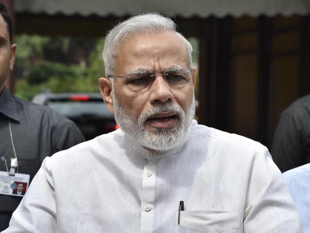 Narendra Modi talks to the media after his arrival at the opening day of the monsoon session of the Parliament, in New Delhi.(Ajay Aggarwal/HT Photo)