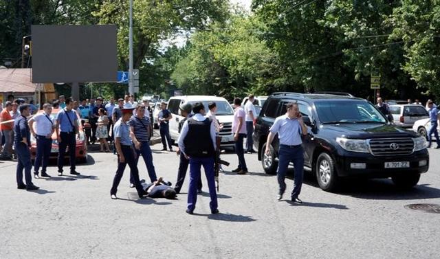 Police officers detain a man after an attack in the centre of Almaty, Kazakhstan on Monday. (Reuters) Police officers detain a man after an attack in the centre of Almaty, Kazakhstan on Monday. (Reuters)