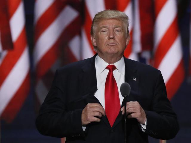 Republican presidential candidate Donald Trump arrives to speak on the last day of the Republican National Convention on July 21, 2016, in Cleveland, Ohio. /(AFP)