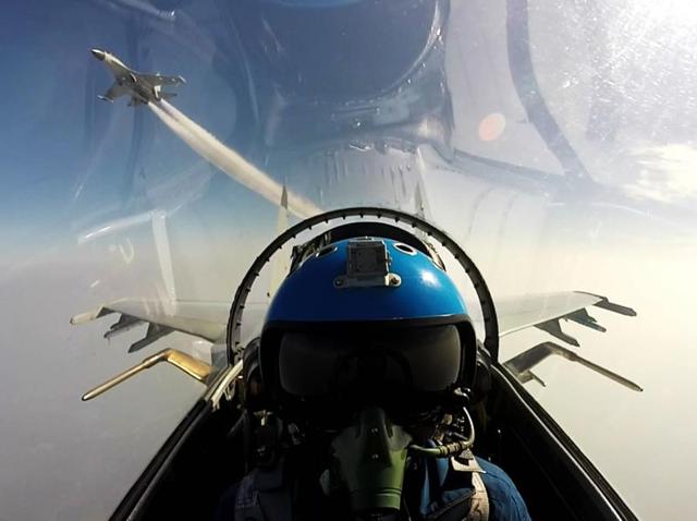 This undated photo shows two Chinese jet fighters during a military drill in the South China Sea near China's Hainan Island. (AFP) This undated photo shows two Chinese jet fighters during a military drill in the South China Sea near China's Hainan Island. (AFP)