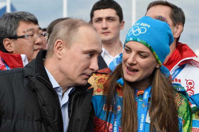 A file photo of Russian President Vladimir Putin speaks with Elena Isinbaeva. (AP Photo) A file photo of Russian President Vladimir Putin speaks with Elena Isinbaeva. (AP Photo)