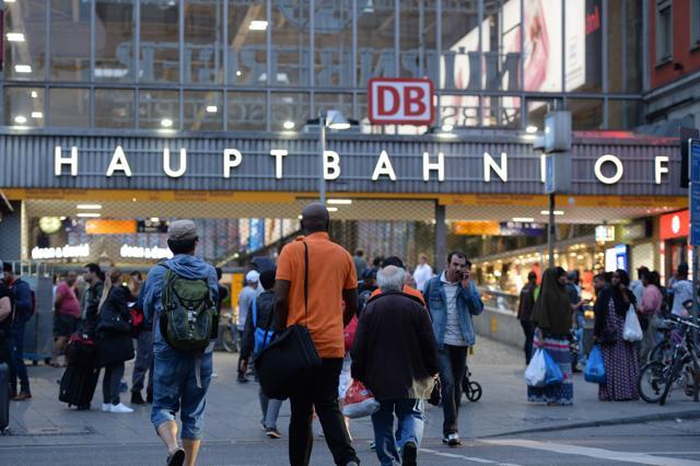 People walk near the main train station following shootings at a shopping mall in Munich. (AFP Photo) People walk near the main train station following shootings at a shopping mall in Munich. (AFP Photo)