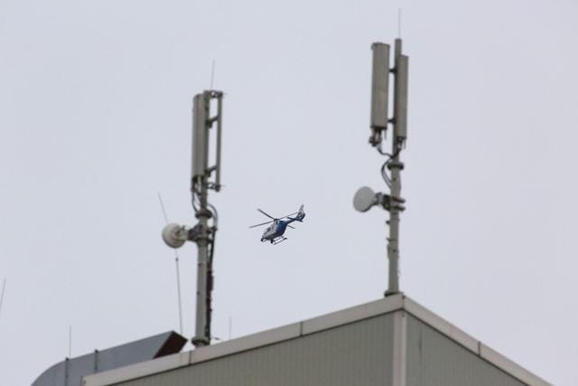 A helicopter flies over the area of Stachus square in Munich. (AFP Photo) A helicopter flies over the area of Stachus square in Munich. (AFP Photo)