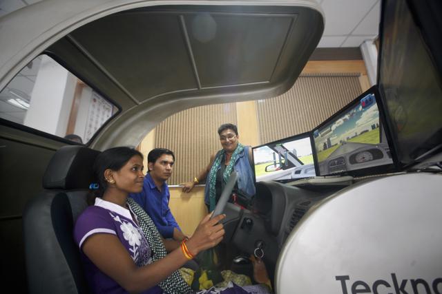 The women are given driving lessons on simulators, replicating an actual, on-road driving experience. (Azad Foundation)