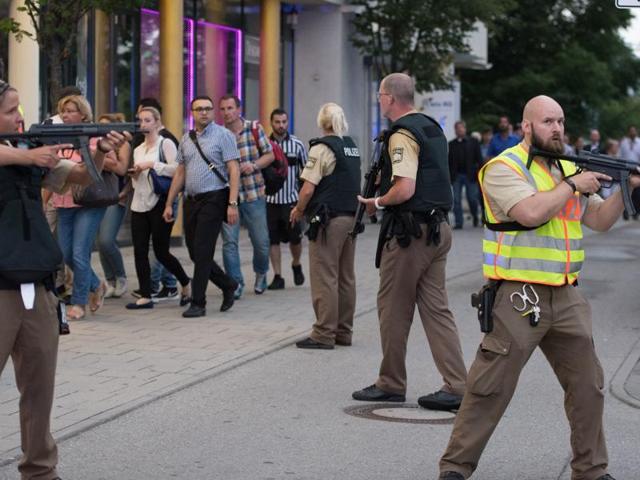 Police secures an area of a subway station Karlsplatz (Stachus) near a shopping mall following a shooting in Munich. Several people were killed on Friday in a shooting rampage. (AP) Police secures an area of a subway station Karlsplatz (Stachus) near a shopping mall following a shooting in Munich. Several people were killed on Friday in a shooting rampage. (AP)