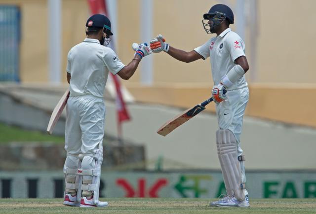 Skipper Virat Kohli (L) congratulates Ravichandran Ashwin (AFP) Skipper Virat Kohli (L) congratulates Ravichandran Ashwin (AFP)