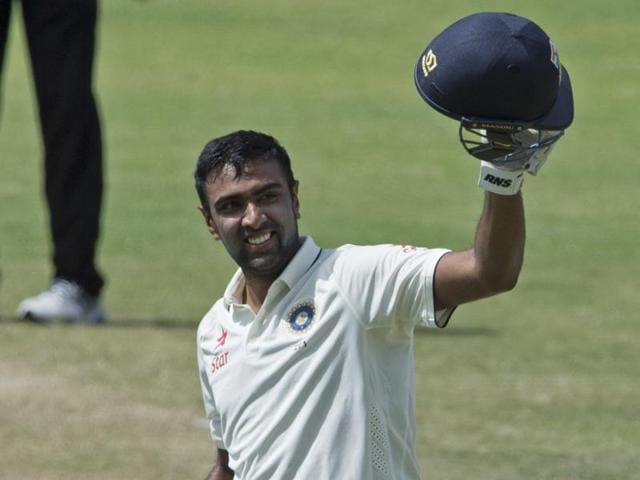India's Ravichandran Ashwin raises his bat after scoring a century, his first overseas and third overall in Test cricket, at the Sir Vivian Richards Stadium in North Sound, Antigua, on Friday. (AP) India's Ravichandran Ashwin raises his bat after scoring a century, his first overseas and third overall in Test cricket, at the Sir Vivian Richards Stadium in North Sound, Antigua, on Friday. (AP)