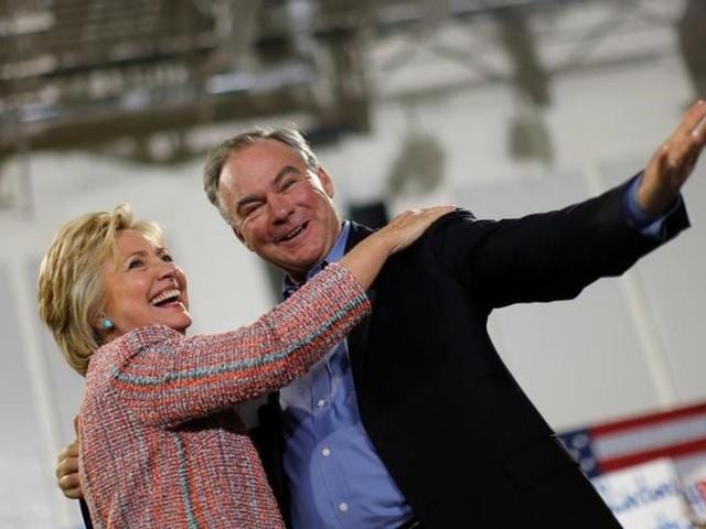 Democratic US presidential candidate Hillary Clinton and US senator Tim Kaine react during a campaign rally at Ernst Community Cultural Center in Annandale. (Reuters File) Democratic US presidential candidate Hillary Clinton and US senator Tim Kaine react during a campaign rally at Ernst Community Cultural Center in Annandale. (Reuters File)