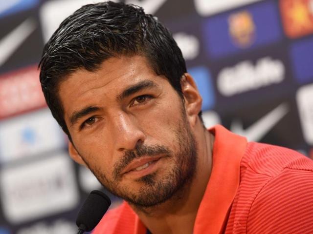A file photo of Lionel Messi and Luis Suarez. (AFP Photo) A file photo of Lionel Messi and Luis Suarez. (AFP Photo)