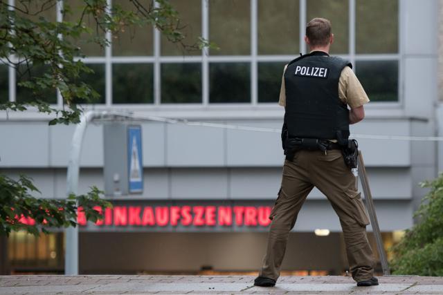 A police officer stands outside the Olympia mall in Munich, southern Germany. (AP Photo) A police officer stands outside the Olympia mall in Munich, southern Germany. (AP Photo)