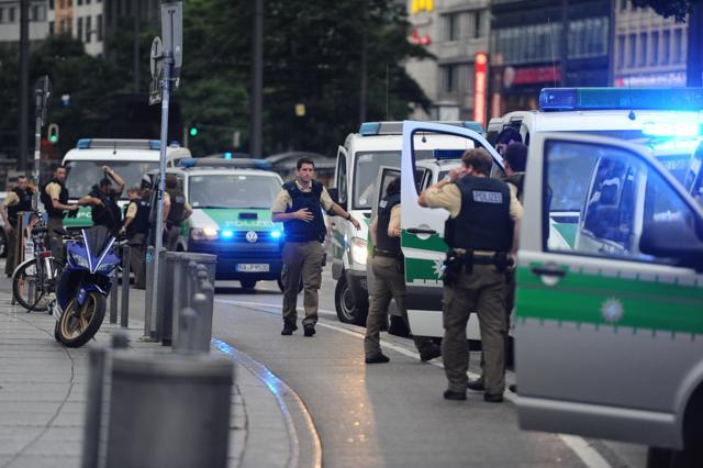 Police officers search the area near the Stachus square after a shooting was reported there in Munich. (AP Photo) Police officers search the area near the Stachus square after a shooting was reported there in Munich. (AP Photo)