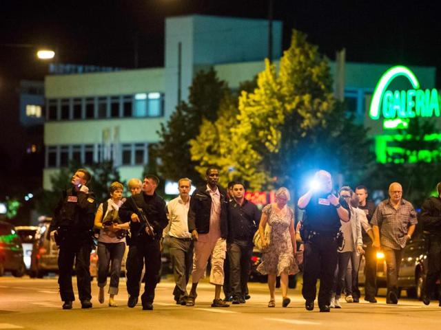 People are evacuated from the area around the shopping mall Olympia Einkaufzentrum OEZ in Munich on July 22, 2016 after gunmen went on a shooting rampage in the busy shopping centre. (AFP) People are evacuated from the area around the shopping mall Olympia Einkaufzentrum OEZ in Munich on July 22, 2016 after gunmen went on a shooting rampage in the busy shopping centre. (AFP)