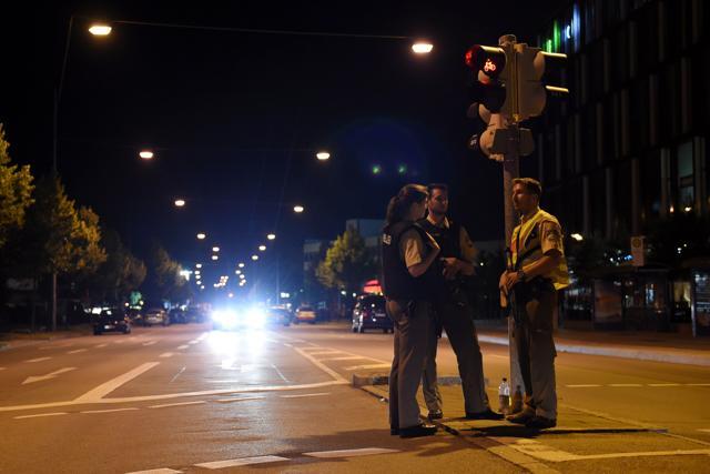 Police officers secure the area near the shopping mall the Olympia Einkaufzentrum in Munich. (AFP) Police officers secure the area near the shopping mall the Olympia Einkaufzentrum in Munich. (AFP)