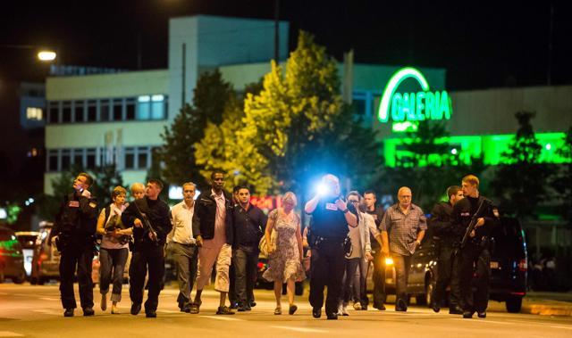 People are evacuated from the area around the shopping mall Olympia Einkaufzentrum OEZ in Munich on July 22, 2016 after a shooting rampage in the busy shopping centre, killing nine people. (AFP) People are evacuated from the area around the shopping mall Olympia Einkaufzentrum OEZ in Munich on July 22, 2016 after a shooting rampage in the busy shopping centre, killing nine people. (AFP)