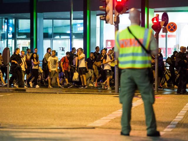 People are evacuated from the area around the shopping mall Olympia Einkaufzentrum OEZ in Munich on July 22, 2016 after gunmen went on a shooting rampage in the busy shopping centre, killing nine people (AFP) People are evacuated from the area around the shopping mall Olympia Einkaufzentrum OEZ in Munich on July 22, 2016 after gunmen went on a shooting rampage in the busy shopping centre, killing nine people (AFP)
