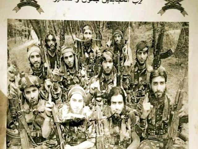 A poster carrying a photo of 11 militants dressed in combat gear and holding AK-47s was recently uploaded on the website of local daily Kashmir Reader after the death of Hizb commander Burhan Wani. (Photo courtesy: Kashmir Reader) A poster carrying a photo of 11 militants dressed in combat gear and holding AK-47s was recently uploaded on the website of local daily Kashmir Reader after the death of Hizb commander Burhan Wani. (Photo courtesy: Kashmir Reader)