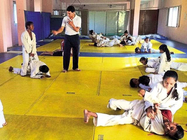 Budding judo players getting training from district judo coach at SD Phullarwan School in Jalandhar on Friday. (HT Photo) Budding judo players getting training from district judo coach at SD Phullarwan School in Jalandhar on Friday. (HT Photo)