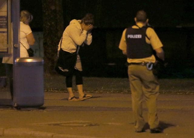 A woman reacts following the shooting rampage at the Olympia shopping mall in Munich, Germany. (Reuters) A woman reacts following the shooting rampage at the Olympia shopping mall in Munich, Germany. (Reuters)