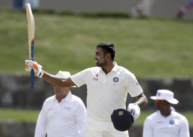 IRavichandran Ashwin raises his bat after scoring a century against West Indies. (AP) IRavichandran Ashwin raises his bat after scoring a century against West Indies. (AP)