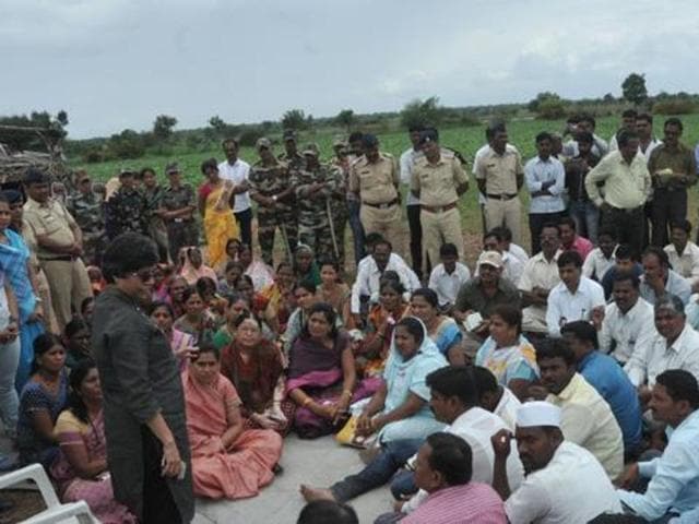 Pune police commissioner Rashmi Shukla talks to the villagers in Kopardi.(HT photo)