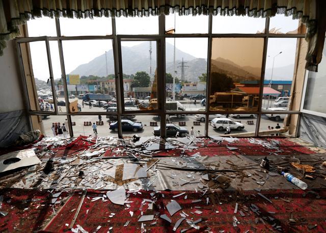 Broken glass and debris are seen inside a resturant a day after the suicide attack in Kabul. (REUTERS) Broken glass and debris are seen inside a resturant a day after the suicide attack in Kabul. (REUTERS)