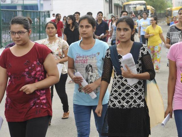 Students come out from their center after appearing in NEET-2 exam at KB DAV, Sector 7, Chandigarh on Sunday.(Karun Sharma/ Hindustan Times)