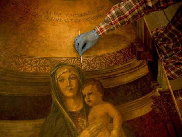 Restoration work includes cleaning paintings through a special process. (Gurinder Osan/HT Photo) 
