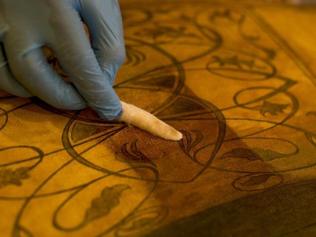 Restoration work includes cleaning paintings through a special process. (Gurinder Osan/HT Photo) 