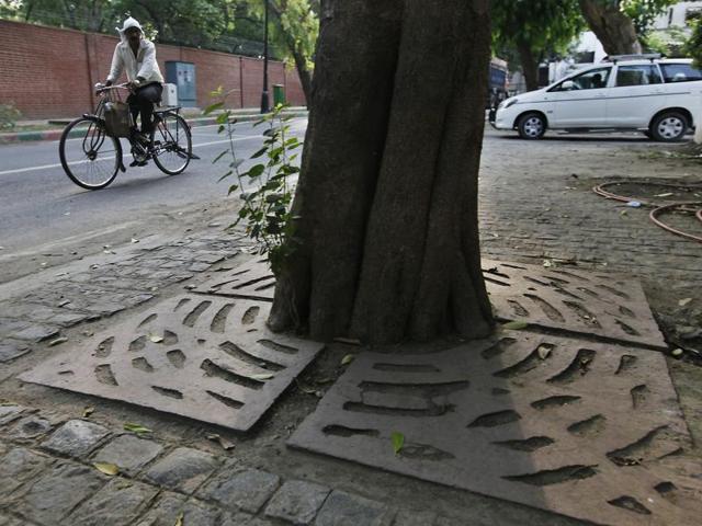 Most trees are sealed with cement, though it is mandatory to leave 6x6 feet open space around them. (Raj K Raj/ Hindustan Times File) Most trees are sealed with cement, though it is mandatory to leave 6x6 feet open space around them. (Raj K Raj/ Hindustan Times File)