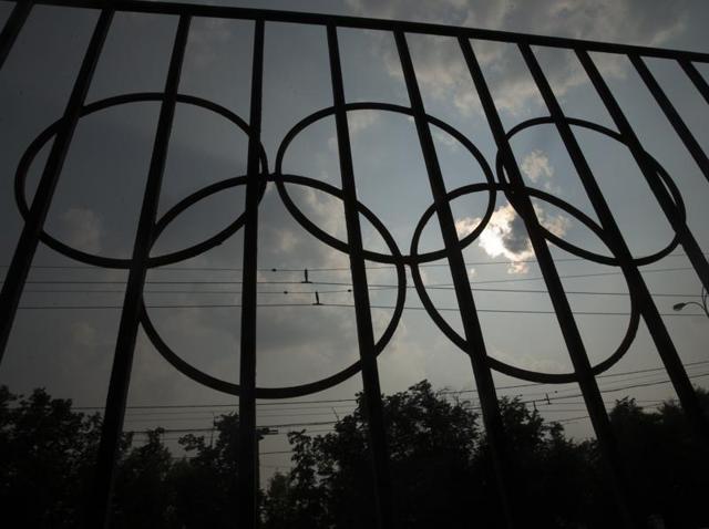 The Olympics rings are seen on a fence in front of the Russian Olympic Committee building in Moscow.(AP Photo) The Olympics rings are seen on a fence in front of the Russian Olympic Committee building in Moscow.(AP Photo)