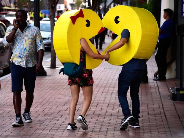 Pac-Man and Ms Pac-Man cosplayers attend Comic-Con. Adorbs. (AFP) Pac-Man and Ms Pac-Man cosplayers attend Comic-Con. Adorbs. (AFP)
