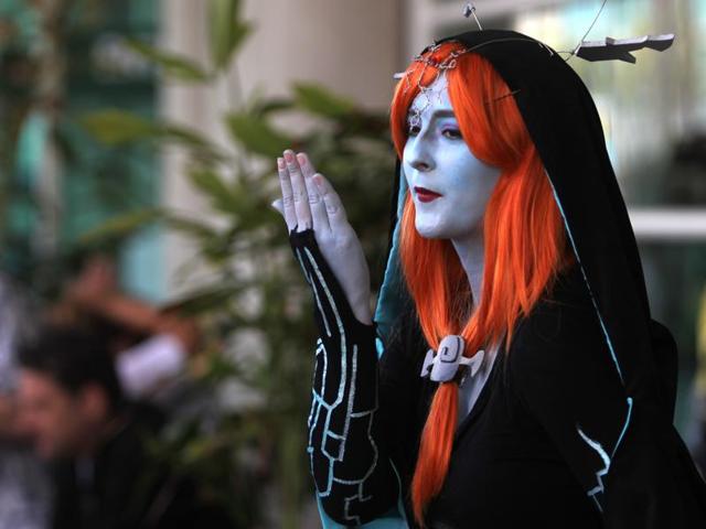 A woman playing the part of Midna from the Legend of Zelda video game, blows a kiss. (AFP) A woman playing the part of Midna from the Legend of Zelda video game, blows a kiss. (AFP)