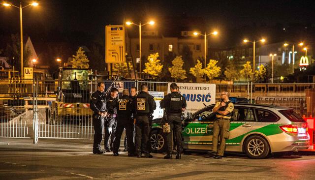 Police stand at the scene of a suicide attack in the southern German city of Ansbach. (AFP) Police stand at the scene of a suicide attack in the southern German city of Ansbach. (AFP)