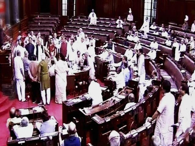 Opposition members protest in front of deputy chairman of Rajya Sabha PJ Kurien during the monsoon session of Parliament in New Delhi.(PTI Photo) Opposition members protest in front of deputy chairman of Rajya Sabha PJ Kurien during the monsoon session of Parliament in New Delhi.(PTI Photo)