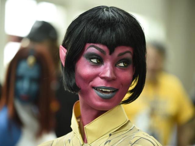 Sara Moni, dressed as the World of Warcraft's Sinestra, poses for photographers on Saturday, day three of the Comic-Con International held at the San Diego Convention Center. (Denis Poroy/Invision/AP)