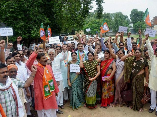 BJP workers protest against BSP general secretary Nasimuddin Siddqui over his comments on Dayashankar’s family members in Mirzapur on Saturday. (PTI) BJP workers protest against BSP general secretary Nasimuddin Siddqui over his comments on Dayashankar’s family members in Mirzapur on Saturday. (PTI)