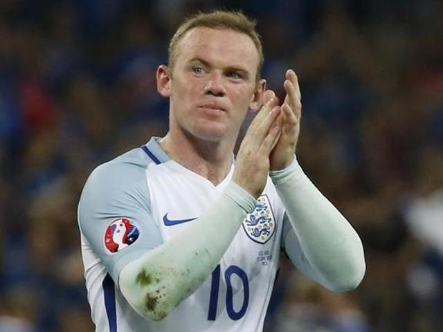 England's Wayne Rooney applauds the fans at the end of the game. (Reuters Photo) England's Wayne Rooney applauds the fans at the end of the game. (Reuters Photo)