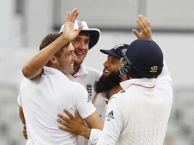 England's Chris Woakes celebrates taking the wicket of Pakistan's Mohammad Amir with teammates. He grabbed 3-41 to stretch his wicket tally to 18 in two test matches. (Reuters) England's Chris Woakes celebrates taking the wicket of Pakistan's Mohammad Amir with teammates. He grabbed 3-41 to stretch his wicket tally to 18 in two test matches. (Reuters)