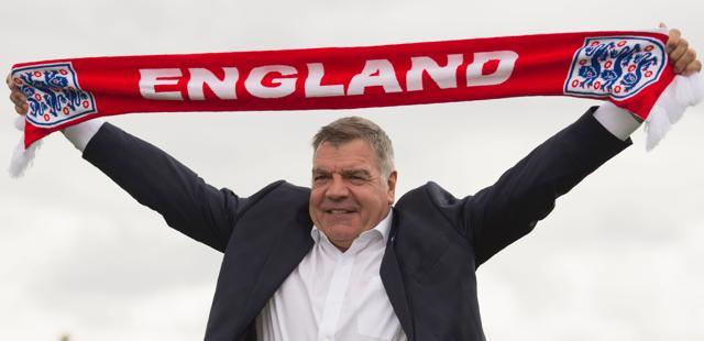 New England football team manager Sam Allardyce wears an England scarf during a photocall at St George's Park, near Burton-on-Trent. (AFP Photo) New England football team manager Sam Allardyce wears an England scarf during a photocall at St George's Park, near Burton-on-Trent. (AFP Photo)