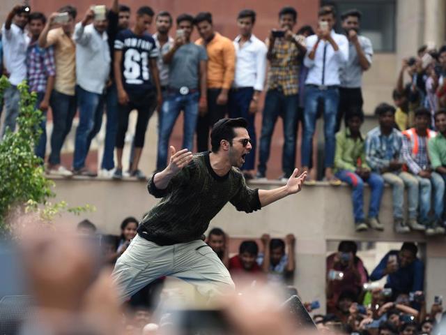 Varun Dhawan is all charged up as he gears up for live stunts infront of students in Noida. The event was a promotional one for his upcoming film Dishoom. (AFP)