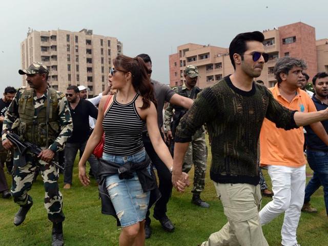 Varun Dhawan and Jacqueline Fernandez arrive for a promotional event of Dishoom in Greater Noida, 40km east of New Delhi. (AFP)