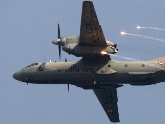 In this file photo, an Indian Air Force's (IAF) AN-32 transport aircraft releases chaff as it flies past the IAF Day Parade in New Delhi, India.(AP) In this file photo, an Indian Air Force's (IAF) AN-32 transport aircraft releases chaff as it flies past the IAF Day Parade in New Delhi, India.(AP)