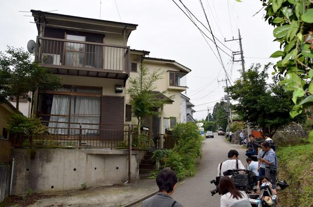 Photographers gather outside the residence of Uematsu. (AFP) Photographers gather outside the residence of Uematsu. (AFP)