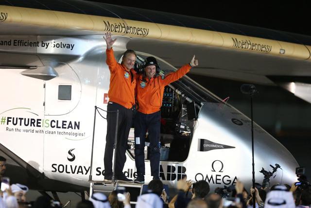 Pilots Andre Borschberg (L) and Bertrand Piccard celebrate after their arrival on Solar Impulse 2 at an airport in Abu Dhabi on Tuesday. (Reuters) Pilots Andre Borschberg (L) and Bertrand Piccard celebrate after their arrival on Solar Impulse 2 at an airport in Abu Dhabi on Tuesday. (Reuters)