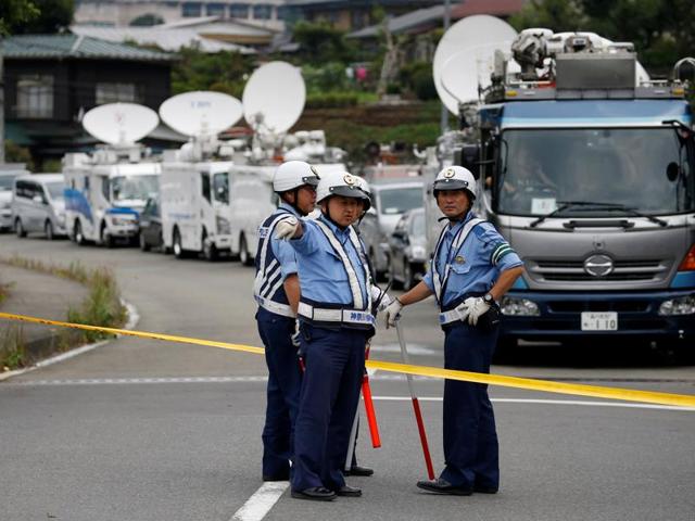 Police officers stand guard at a facility for the disabled, where a deadly attack by a knife-wielding man took place, in Sagamihara, Kanagawa prefecture, Japan, July 26, 2016. (Reuters Photo) Police officers stand guard at a facility for the disabled, where a deadly attack by a knife-wielding man took place, in Sagamihara, Kanagawa prefecture, Japan, July 26, 2016. (Reuters Photo)