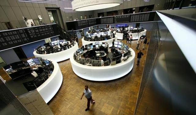 Traders work at their desks in front of the German share price index, DAX board, at the stock exchange in Frankfurt, Germany after Britain voted to leave the European Union in the EU Brexit referendum. (Reuters file photo) Traders work at their desks in front of the German share price index, DAX board, at the stock exchange in Frankfurt, Germany after Britain voted to leave the European Union in the EU Brexit referendum. (Reuters file photo)