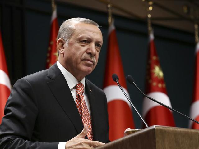 Turkey's President Recep Tayyip Erdogan, gestures during a televised address at the presidential palace in Ankara on Sunday/ (AP) Turkey's President Recep Tayyip Erdogan, gestures during a televised address at the presidential palace in Ankara on Sunday/ (AP)